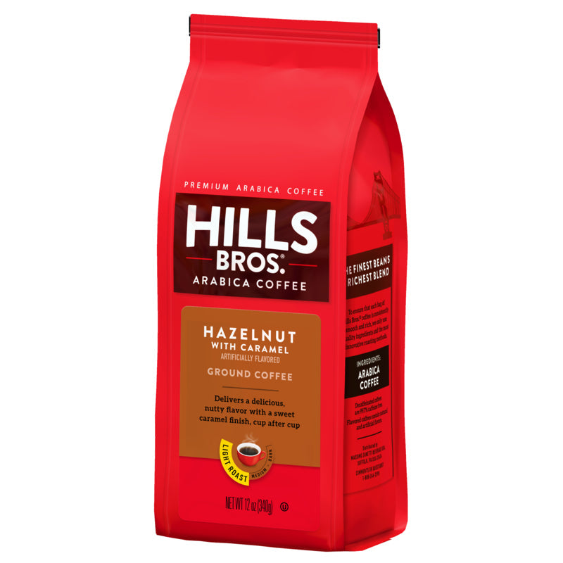 Indulge in the rich flavor of Hills Bros. Coffee's Hazelnut with Caramel - Light Roast - Ground - Premium Arabica coffee, expertly crafted for your enjoyment.