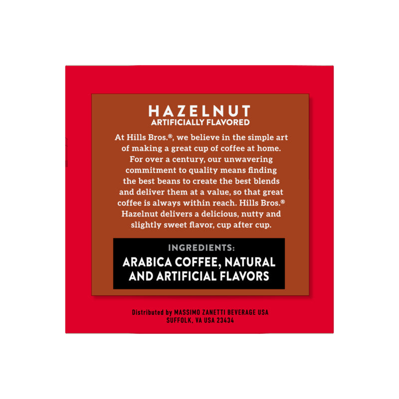 A red package with a brown label describes Hazelnut Blend - Medium Roast - Single-Serve Coffee Pods, an artificially flavored coffee from Hills Bros. Coffee. Made with premium Arabica beans, it includes natural and artificial flavors. Distributed by Massimo Zanetti.