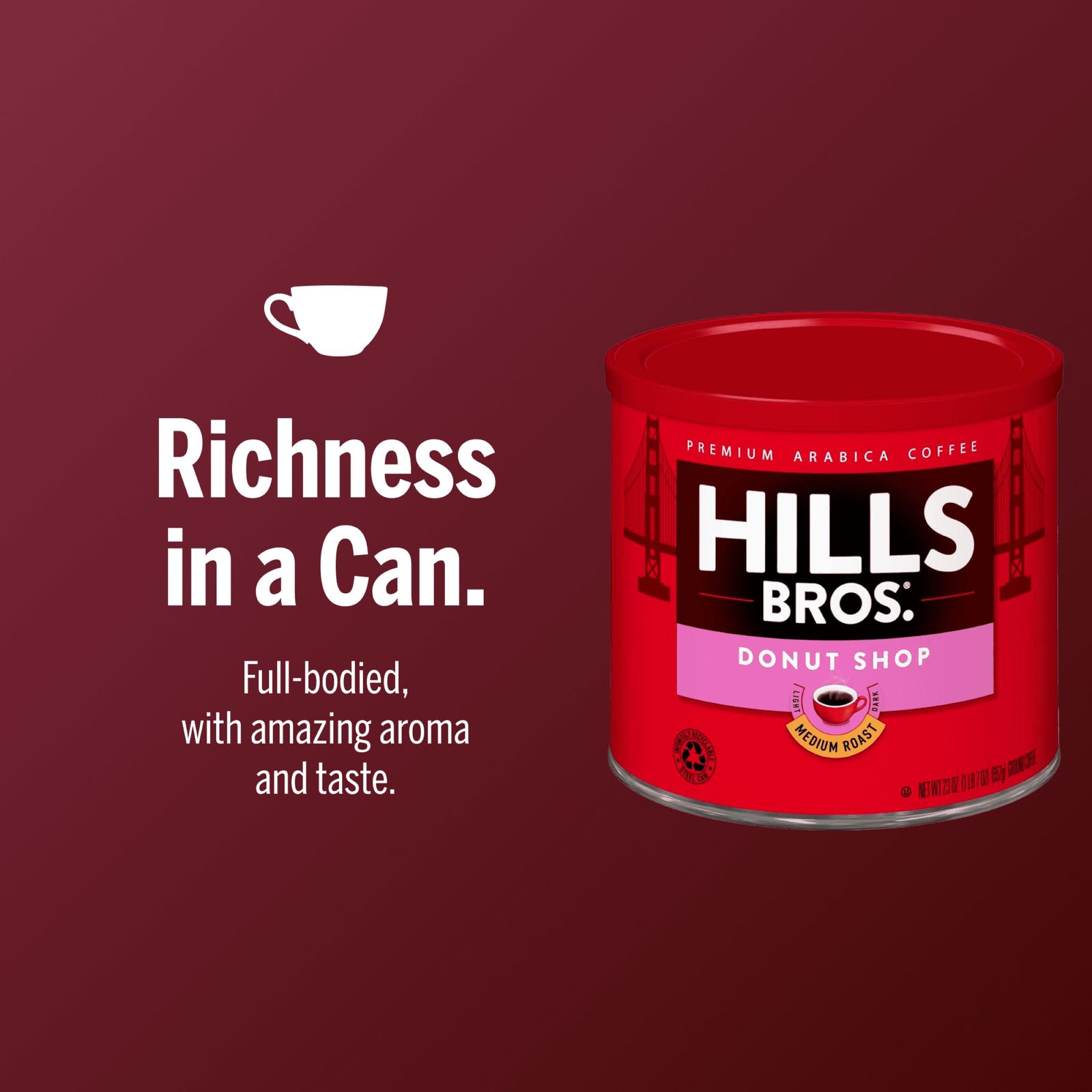 A can of Hills Bros. Coffee Donut Shop Medium Roast Ground Premium Arabica is displayed on a red background with the tagline "Richness in a Can" and a description highlighting its aromatic flavor and delicious taste.