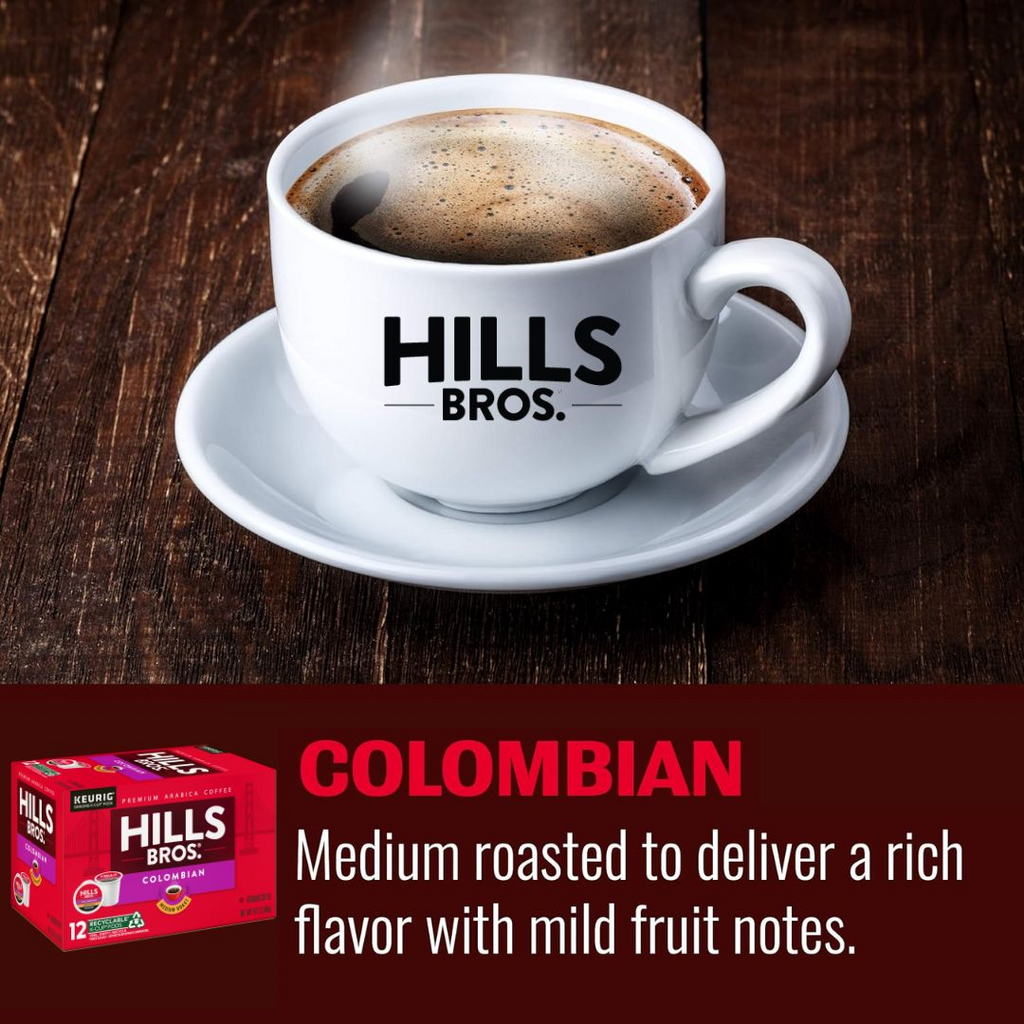 A white coffee cup with a logo is filled with coffee brewed from Hills Bros. Coffee Colombian - Medium Roast Keurig K-Cup® Pods. Text below reads: "Colombian Blend. Medium roasted to deliver a rich flavor with mild fruit notes." A box of premium Arabica beans coffee pods is shown.