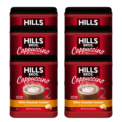 Six containers of Hills Bros. Cappuccino White Chocolate Caramel Instant Cappuccino Mix are arranged in two columns against a white background, ready to help you enjoy a creamy coffeehouse-style cappuccino at home.