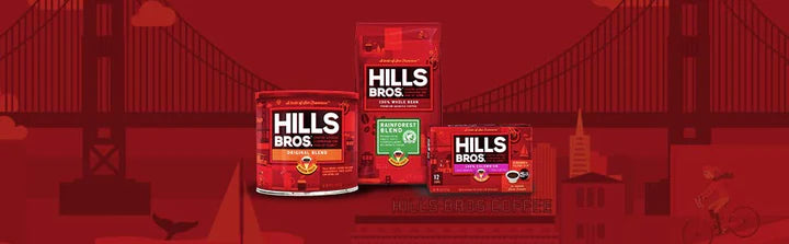 A range of Hills Bros coffee products are displayed against a red background featuring a bridge. The products include a can of ground coffee, a bag of beans, and a box of K-Cup pods.
