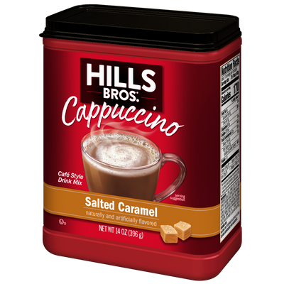 A red container of Hills Bros. Cappuccino Salted Caramel - Instant Cappuccino Mix, showcasing a mug of instant cappuccino and caramel pieces on the front, perfect for creating a delicious salted caramel cappuccino at home.