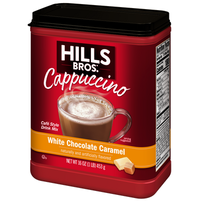 A 16 oz container of Hills Bros. Cappuccino White Chocolate Caramel Instant Cappuccino Mix features an image of a cappuccino in a brown mug on the label. With nutritional facts clearly displayed on the side, this creamy mix offers a convenient treat any time of day.