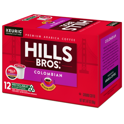 A red box of Hills Bros. Coffee Colombian Medium Roast K-Cup® Pods, containing 12 premium Arabica coffee pods in recyclable packaging, with Golden Gate Bridge graphics in the background.