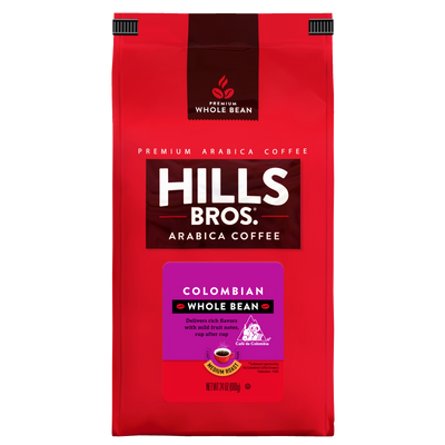 A red bag of Hills Bros. Coffee 100% Colombian Medium Roast Whole Bean, crafted from premium Arabica beans, features purple and yellow label accents highlighting flavor notes and a net weight of 24 oz (680g).