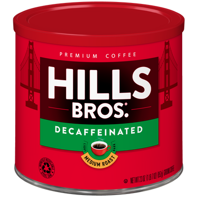 A red can of Hills Bros. Coffee Decaf Original Blend, Medium Roast, ground coffee, 23 oz, featuring a cup image and Golden Gate Bridge graphics on the label.