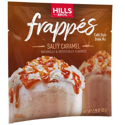 Hills Bros. Frappes Salty Caramel single serve frappé drink mix packet, featuring an enticing image of a caramel drink topped with whipped cream on the front.