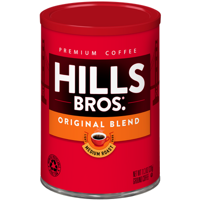 A red can of Hills Bros. Coffee Original Blend Medium Roast Ground, 11.3 oz, featuring an image of a coffee cup on the label. Made from premium coffee beans, this Hills Bros. Coffee ground coffee offers a smooth and satisfying flavor in every cup.