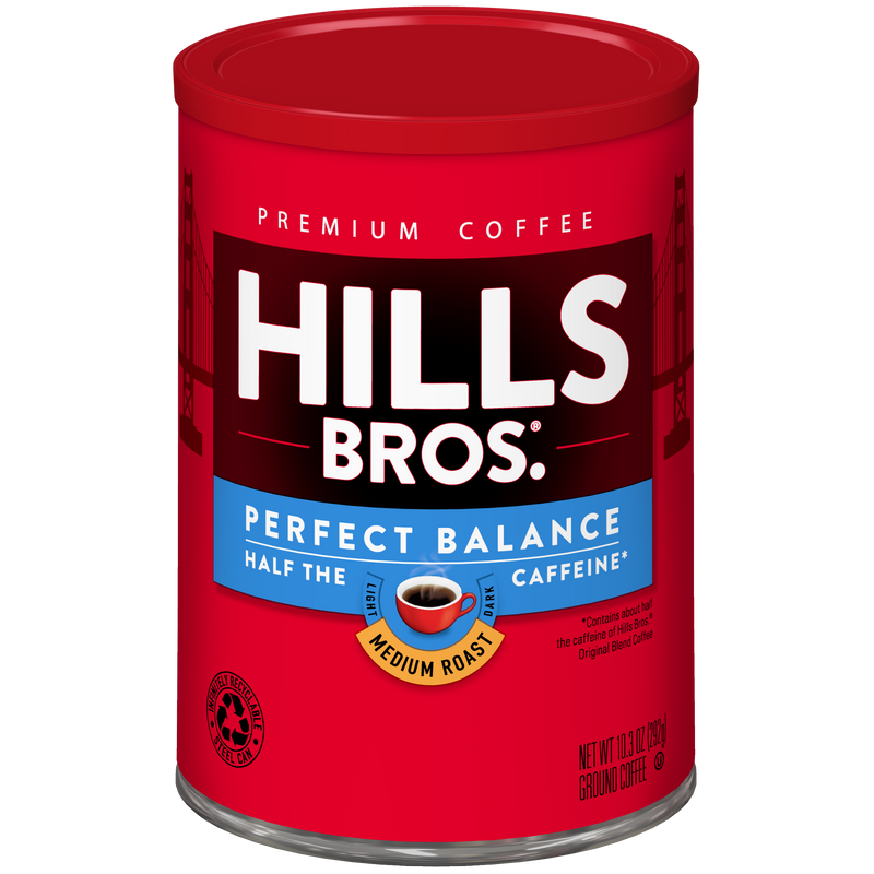 A red canister of Hills Bros. Coffee Perfect Balance Medium Roast Ground Coffee, made from premium coffee beans, featuring “Half the Caffeine” text and a coffee cup image on the label.