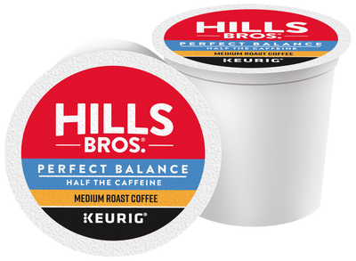 Two single-serve K-Cup® pods with “Hills Bros. Coffee Perfect Balance - Medium Roast” on the lids.
